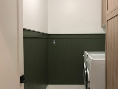 Adding Green Bead Board to the Laundry Room